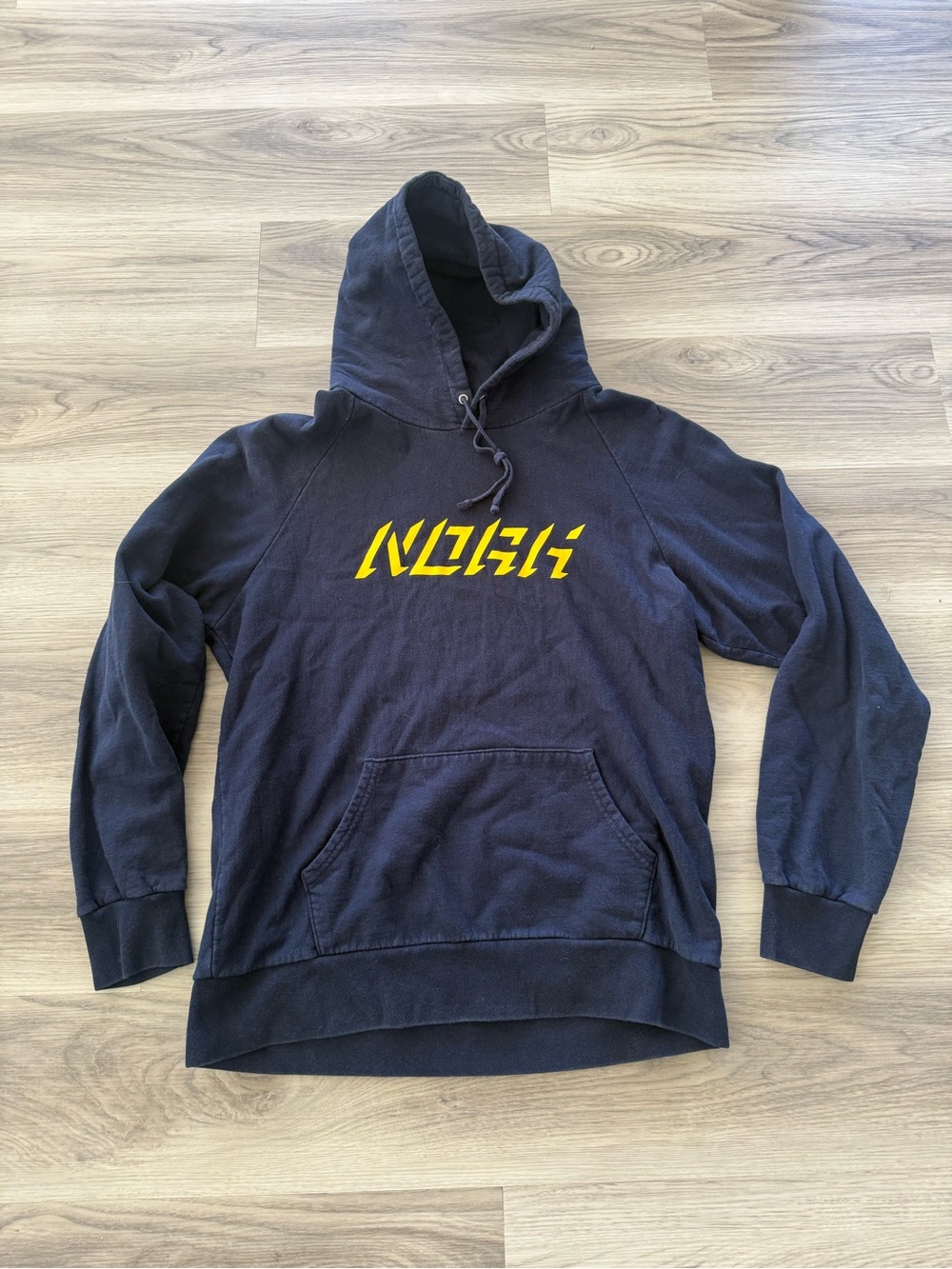 Noah NYC Navy Hoodie with Yellow Script Logo